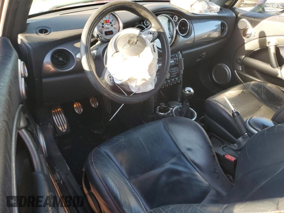 2007 MINI Convertible S with VIN WMWRH33587TJ43499, listed as a Copart auction lot 76266684 with 103,691 mi miles and Salvage title. Bid and sale history available at DreamBid. Image 8.