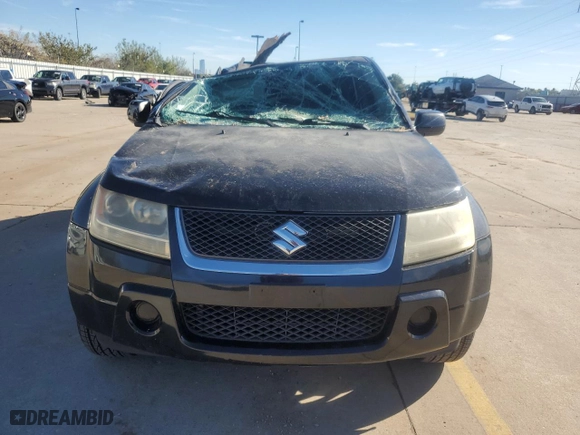 2007 Suzuki Grand Vitara with VIN JS3TE941X74202046, listed as a Copart auction lot 80221394 with 153,791 mi miles and Salvage Title. Bid and sale history available at carsss.com. Image 5.