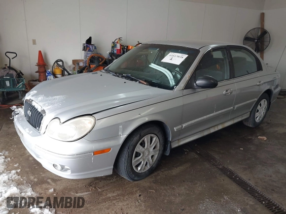 2002 Hyundai Sonata with VIN KMHWF25S42A574561, listed as a IAAI auction lot 41613838 with 141,808 mi miles. Bid and sale history available at carsss.com. Image 2.