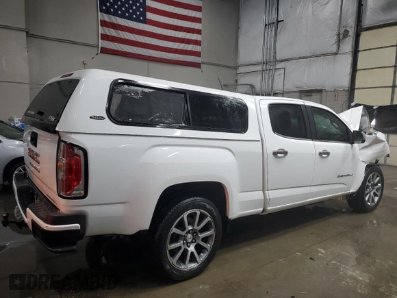 2022 GMC Canyon 4WD Denali with VIN 1GTG6EEN3N1318081, listed as a Copart auction lot 45707795 with 46,882 mi miles and Salvage Title. Bid and sale history available at carsss.com. Image 3.
