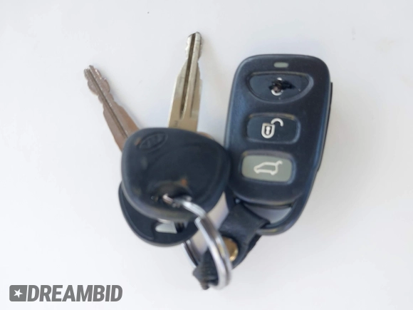 2007 Kia Sorento LX z VIN KNDJC736775722258, wystawiony jako IAAI lot #42409147 z przebiegiem 130 863 mil mil oraz . Historia ofert i sprzedaży dostępna na DreamBid. Obrazek 11.