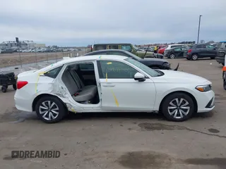 2024 Honda Civic LX z VIN 2HGFE2F20RH543598, wystawiony jako IAAI lot #41646520 z przebiegiem 18 923 mil mil oraz . Historia ofert i sprzedaży dostępna na DreamBid. Obrazek 14.