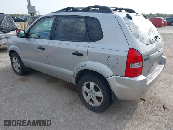 2006 Hyundai Tucson GL with VIN KM8JM12BX6U469719, listed as a IAAI auction lot 41899134 with 136,179 mi miles. Bid and sale history available at carsss.com. Image 3.