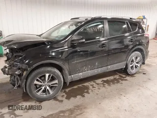 2018 Toyota RAV4 XLE with VIN 2T3RFREV3JW817989, listed as a IAAI auction lot 41636957 with 182,265 mi miles. Bid and sale history available at carsss.com. Image 18.