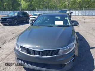 2016 Kia Optima LX with VIN KNAGT4L3XG5078248, listed as a IAAI auction lot 42011616 with 150,000 mi miles. Bid and sale history available at carsss.com. Image 12.