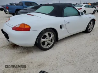 1998 Porsche Boxster с VIN WP0CA2987WU623387, выставлен на аукционе Copart как лот 76859594 с пробегом Не указан миль и Списание • Salvage title. История ставок и продаж доступна на DreamBid. Изображение 3.