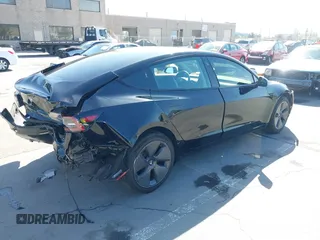 2021 Tesla Model 3 Standard Range Plus z VIN 5YJ3E1EA5MF939299, wystawiony jako IAAI lot #42146702 z przebiegiem 43 382 mil mil oraz . Historia ofert i sprzedaży dostępna na DreamBid. Obrazek 4.