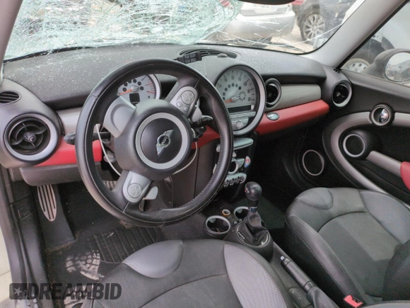 2009 MINI Hardtop S with VIN WMWMF73569TW87347, listed as a Copart auction lot 59445035 with Not provided miles and Salvage title. Bid and sale history available at DreamBid. Image 8.