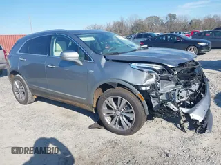 2024 Cadillac XT5 FWD Premium Luxury with VIN 1GYKNCR45RZ752636, listed as a IAAI auction lot 41202271 with 4,023 mi miles. Bid and sale history available at carsss.com. Image 1.