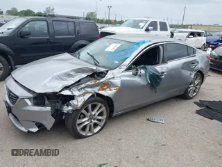 2014 Mazda Mazda6 i Touring with VIN JM1GJ1V59E1105417, listed as a IAAI auction lot 41963071 with 167,985 mi miles. Bid and sale history available at carsss.com. Image 2.