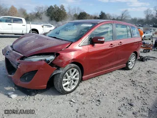 2015 Mazda Mazda5 Grand Touring with VIN JM1CW2DL9F0182785, listed as a Copart auction lot 83183274 with 71,725 mi miles and Salvage Title. Bid and sale history available at carsss.com. Image 1.