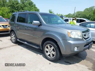 2009 Honda Pilot Touring z VIN 5FNYF48869B038009, wystawiony jako IAAI lot #42390759 z przebiegiem 151 623 mil mil oraz . Historia ofert i sprzedaży dostępna na DreamBid. Obrazek 1.