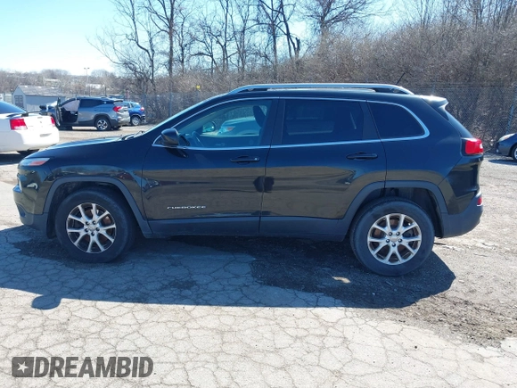 2015 Jeep Cherokee Latitude z VIN 1C4PJMCS2FW620113, wystawiony jako IAAI lot #41865228 z przebiegiem 186 983 mil mil oraz . Historia ofert i sprzedaży dostępna na DreamBid. Obrazek 15.