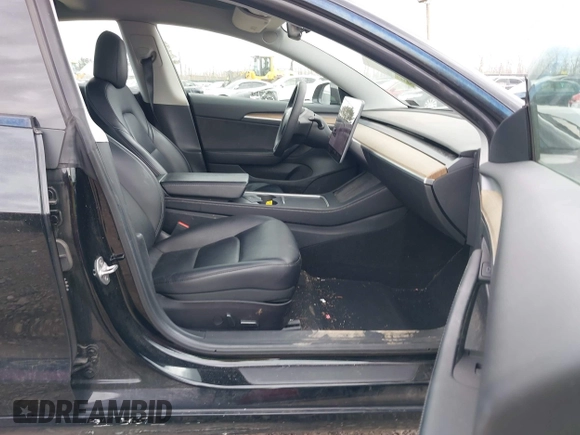 2021 Tesla Model 3 Long Range with VIN 5YJ3E1EB4MF012822, listed as a IAAI auction lot 41918721 with 69,105 mi miles. Bid and sale history available at carsss.com. Image 5.
