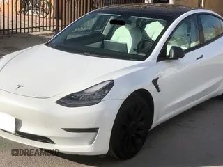 2021 Tesla Model 3 Standard Range Plus with VIN 5YJ3E1EA2MF854372, listed as a Copart auction lot 56435825 with 44,637 mi miles and Salvage Title. Bid and sale history available at DreamBid. Image 2.