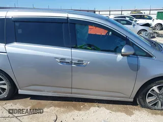 2016 Honda Odyssey Touring Elite with VIN 5FNRL5H96GB090653, listed as a IAAI auction lot 41720195 with 68,969 mi miles. Bid and sale history available at carsss.com. Image 13.