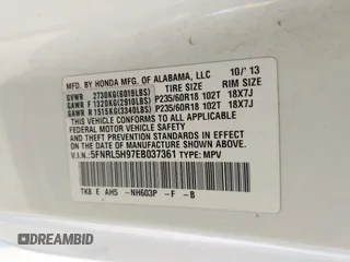 2014 Honda Odyssey Touring with VIN 5FNRL5H97EB037361, listed as a IAAI auction lot 42106742 with 198,279 mi miles and . Bid and sale history available at DreamBid. Image 9.