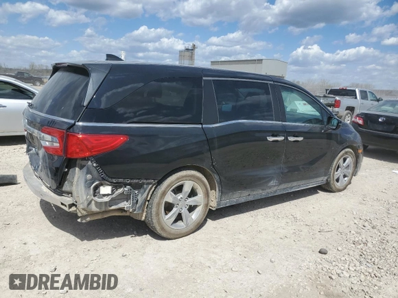 2018 Honda Odyssey EX-L with VIN 5FNRL6H77JB009851, listed as a Copart auction lot 52203155 with 127,575 mi miles and Salvage Title. Bid and sale history available at carsss.com. Image 3.