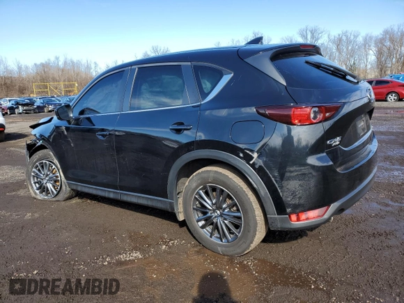 2019 Mazda CX-5 Touring with VIN JM3KFBCM7K0628309, listed as a Copart auction lot 49575435 with 92,687 mi miles and Salvage Title. Bid and sale history available at carsss.com. Image 2.