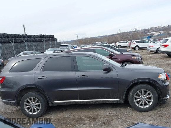 2017 Dodge Durango SXT with VIN 1C4RDJAG1HC918038, listed as a IAAI auction lot 41599549 with 93,417 mi miles and . Bid and sale history available at DreamBid. Image 14.