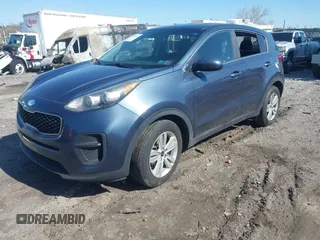 2018 Kia Sportage LX with VIN KNDPM3AC1J7424163, listed as a IAAI auction lot 41989534 with 87,220 mi miles and . Bid and sale history available at carsss.com. Image 16.
