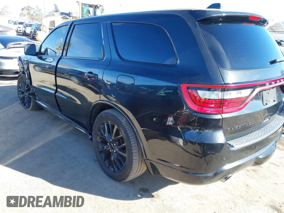 2015 Dodge Durango R/T with VIN 1C4SDHCT5FC937676, listed as a IAAI auction lot 41369508 with 107,075 mi miles and . Bid and sale history available at DreamBid. Image 3.