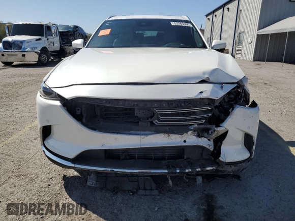 2021 Mazda CX-9 Carbon Edition с VIN JM3TCADY4M0500010, выставлен на аукционе Copart как лот 53283005 с пробегом 55 762 миль миль и Списание • Salvage title. История ставок и продаж доступна на DreamBid. Изображение 5.