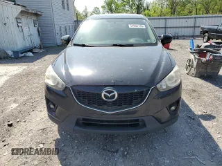 2015 Mazda CX-5 Touring with VIN JM3KE4CY6F0434538, listed as a Copart auction lot 54966145 with 209,447 mi miles and Clean Title. Bid and sale history available at DreamBid. Image 5.