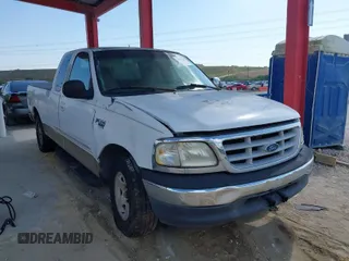 1999 Ford F-150 with VIN 1FTRX17W5XNB33627, listed as a IAAI auction lot 41933365 with 207,118 mi miles and . Bid and sale history available at DreamBid. Image 1.