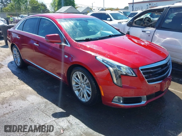 2019 Cadillac XTS Luxury z VIN 2G61M5S39K9118573, wystawiony jako IAAI lot #42014038 z przebiegiem 99 247 mil mil oraz . Historia ofert i sprzedaży dostępna na DreamBid. Obrazek 1.