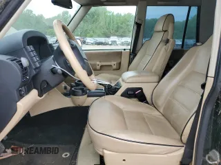 2003 Land Rover Discovery SE z VIN SALTW16463A823650, wystawiony jako Copart lot #52258595 z przebiegiem 194 038 mil mil oraz Szkody całkowita. Historia ofert i sprzedaży dostępna na DreamBid. Obrazek 7.