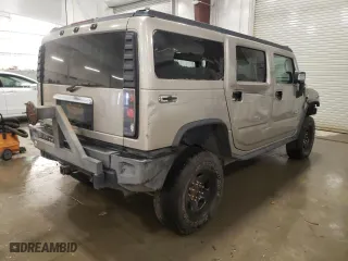 2004 Hummer H2 with VIN 5GRGN23U14H110944, listed as a Copart auction lot 48861935 with NaN miles and Salvage Title. Bid and sale history available at carsss.com. Image 3.
