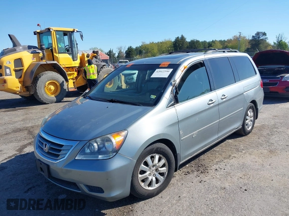 2009 Honda Odyssey EX-L with VIN 5FNRL38729B032786, listed as a IAAI auction lot 42012590 with 188,552 mi miles. Bid and sale history available at carsss.com. Image 2.