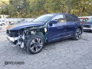 2022 Audi e-tron Premium with VIN WA1AAAGE4NB023022, listed as a Copart auction lot 76661104 with 25,465 mi miles and Salvage Title. Bid and sale history available at carsss.com. Image 1.