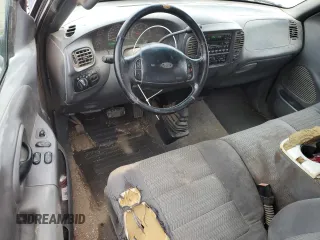 2001 Ford F-150 XL z VIN 1FTRX18W21KA55346, wystawiony jako Copart lot #79252584 z przebiegiem 347 300 mil mil oraz Szkoda całkowita • Salvage title. Historia ofert i sprzedaży dostępna na DreamBid. Obrazek 8.