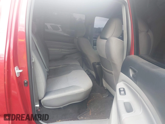 2013 Toyota Tacoma PreRunner z VIN 5TFJU4GN2DX037582, wystawiony jako IAAI lot #42285294 z przebiegiem 162 147 mil mil oraz . Historia ofert i sprzedaży dostępna na DreamBid. Obrazek 8.