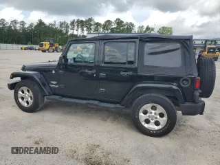 2013 Jeep Wrangler Unlimited Sahara with VIN 1C4HJWEG9DL701391, listed as a Copart auction lot 60492325 with 117,584 mi miles and Salvage title. Bid and sale history available at DreamBid. Image 2.