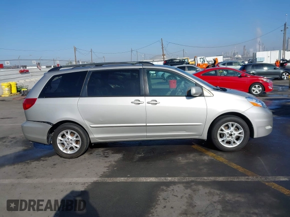 2006 Toyota Sienna XLE with VIN 5TDZA22C06S509177, listed as a IAAI auction lot 41033240 with 163,323 mi miles. Bid and sale history available at carsss.com. Image 13.