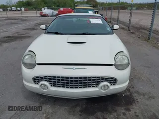 2003 Ford Thunderbird Deluxe with VIN 1FAHP60A03Y113355, listed as a IAAI auction lot 41890414 with 147,620 mi miles. Bid and sale history available at carsss.com. Image 12.