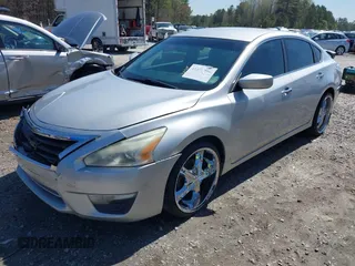 2014 Nissan Altima SL with VIN 1N4AL3AP7EN373903, listed as a IAAI auction lot 41877079 with 211,894 mi miles and . Bid and sale history available at DreamBid. Image 2.