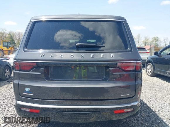 2022 Jeep Wagoneer Series II z VIN 1C4SJVBT2NS166476, wystawiony jako IAAI lot #42132201 z przebiegiem 32 637 mil mil oraz . Historia ofert i sprzedaży dostępna na DreamBid. Obrazek 16.