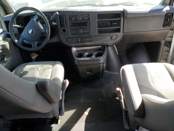 2012 Chevrolet Express Passenger 1LT with VIN 1GAZG1FG4C1100252, listed as a Copart auction lot 73242444 with 76,779 mi miles and Salvage Title. Bid and sale history available at carsss.com. Image 8.