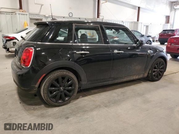 2021 MINI Hardtop 4 Door Oxford Edition with VIN WMWXU7C00M2N49230, listed as a Copart auction lot 77797914 with 51,877 mi miles and Salvage title. Bid and sale history available at DreamBid. Image 3.