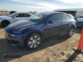 2023 Tesla Model Y Long Range z VIN 7SAYGAEE9PF873950, wystawiony jako Copart lot #55596355 z przebiegiem 47 922 mil mil oraz Szkody całkowita. Historia ofert i sprzedaży dostępna na DreamBid. Obrazek 1.