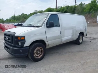 2010 Ford Econoline Cargo Commercial with VIN 1FTNE1EW2ADA91910, listed as a IAAI auction lot 42424530 with 186,898 mi miles and . Bid and sale history available at DreamBid. Image 2.