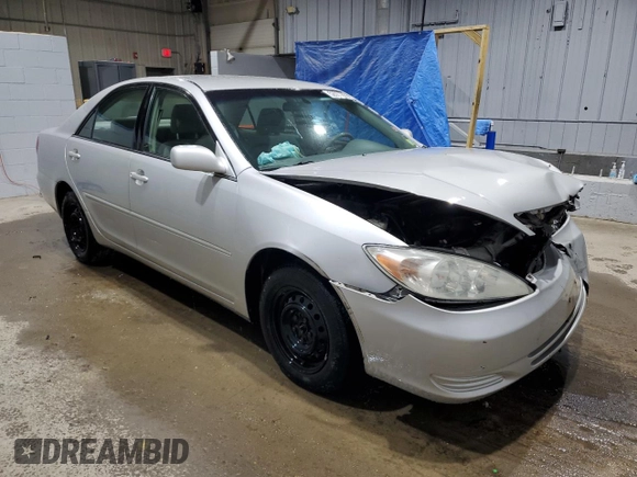 2003 Toyota Camry LE with VIN 4T1BE32KX3U158221, listed as a Copart auction lot 52087875 with 201,020 mi miles and Salvage Title. Bid and sale history available at DreamBid. Image 4.