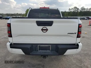 2023 Nissan Frontier Pro-X with VIN 1N6ED1EJ6PN661933, listed as a Copart auction lot 52496135 with 28,533 mi miles and Salvage title. Bid and sale history available at DreamBid. Image 6.