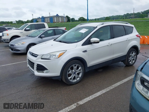 2016 Ford Escape Titanium with VIN 1FMCU9JX4GUB72080, listed as a IAAI auction lot 42519240 with 121,793 mi miles and . Bid and sale history available at DreamBid. Image 17.