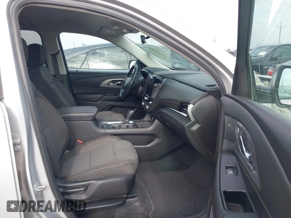 2018 Chevrolet Traverse LT Cloth z VIN 1GNEVGKW5JJ261287, wystawiony jako IAAI lot #42068315 z przebiegiem 152 956 mil mil oraz . Historia ofert i sprzedaży dostępna na DreamBid. Obrazek 5.