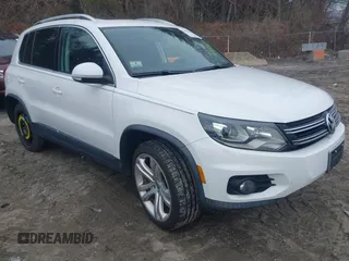 2012 Volkswagen Tiguan S with VIN WVGBV7AX0CW543697, listed as a IAAI auction lot 41853077 with 113,002 mi miles and . Bid and sale history available at DreamBid. Image 1.